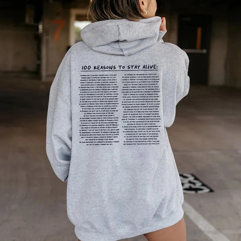 Sweatshirt '100 Gründe, am Leben zu bleiben'.